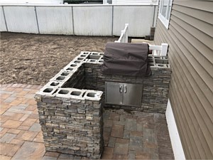 outdoor kitchen bbq area patio corner cambridge toffee onyx sahara chestnut mix